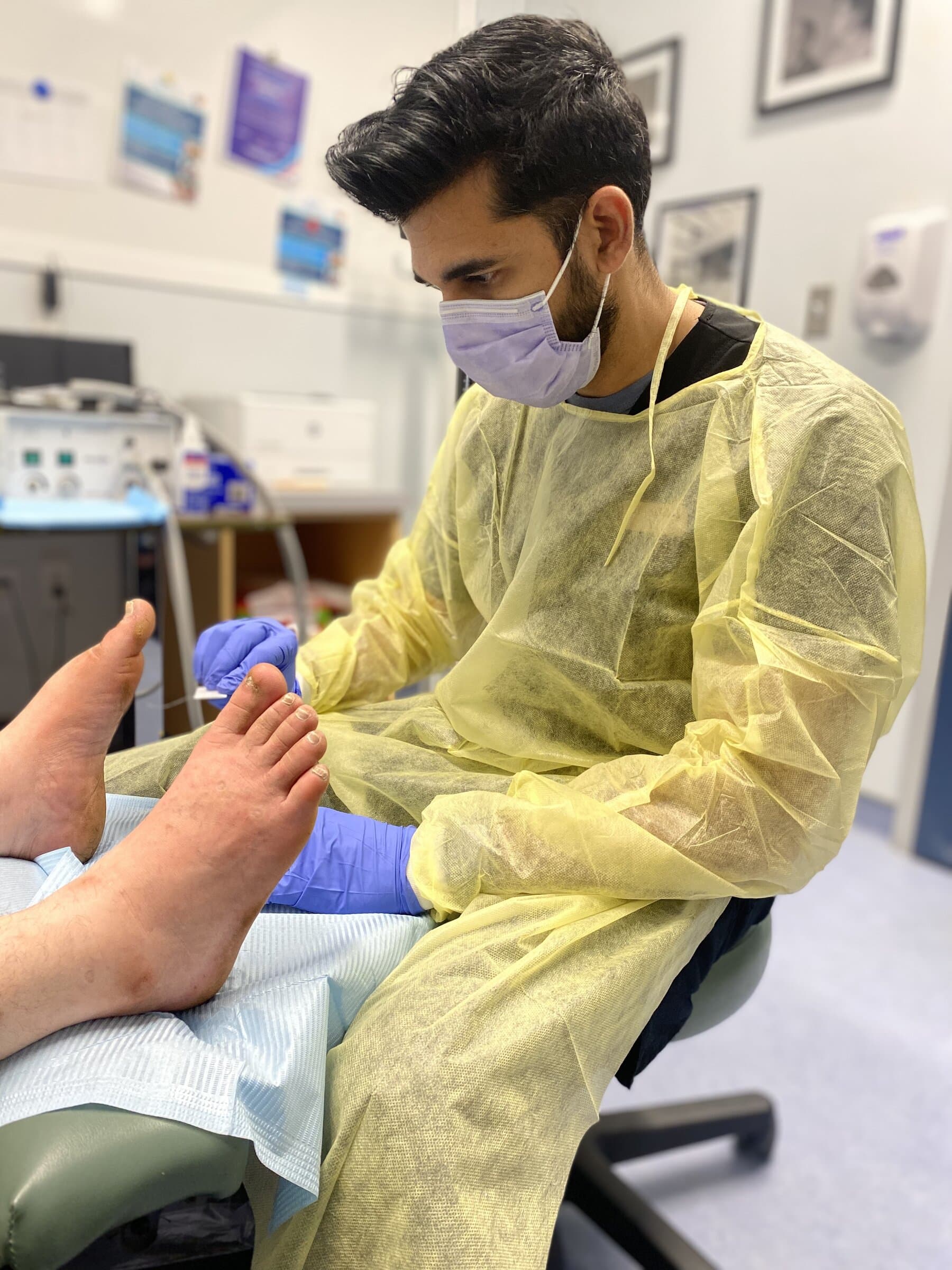 A Mr. Foot Care Registered Nurse providing hands-on foot care